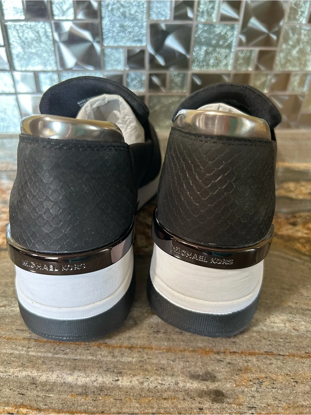 Michael Kors Black and White Slip-On MK Logo Sneakers
